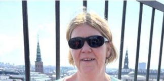 Jobsøgning med handicap i fokus Portræt af Lene Johannsen, der står oppe i Rundetårn med Københavns tårne i baggrunden